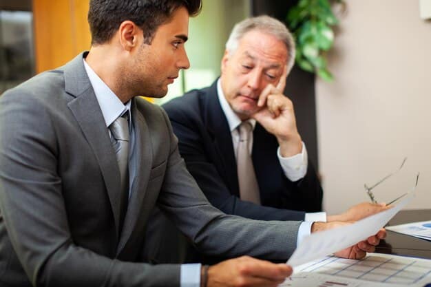 A tax advisor consulting with a business owner, discussing potential changes to the QBI deduction and strategies for minimizing tax liabilities.