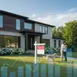 Suburban home with sold sign, symbolizing 2026 housing market growth